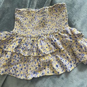 Cute purple and yellow skirt. Perfect for summer and beach days.